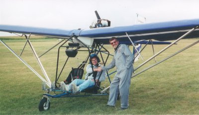 A Quicksilver flying solo near Cushing Field
